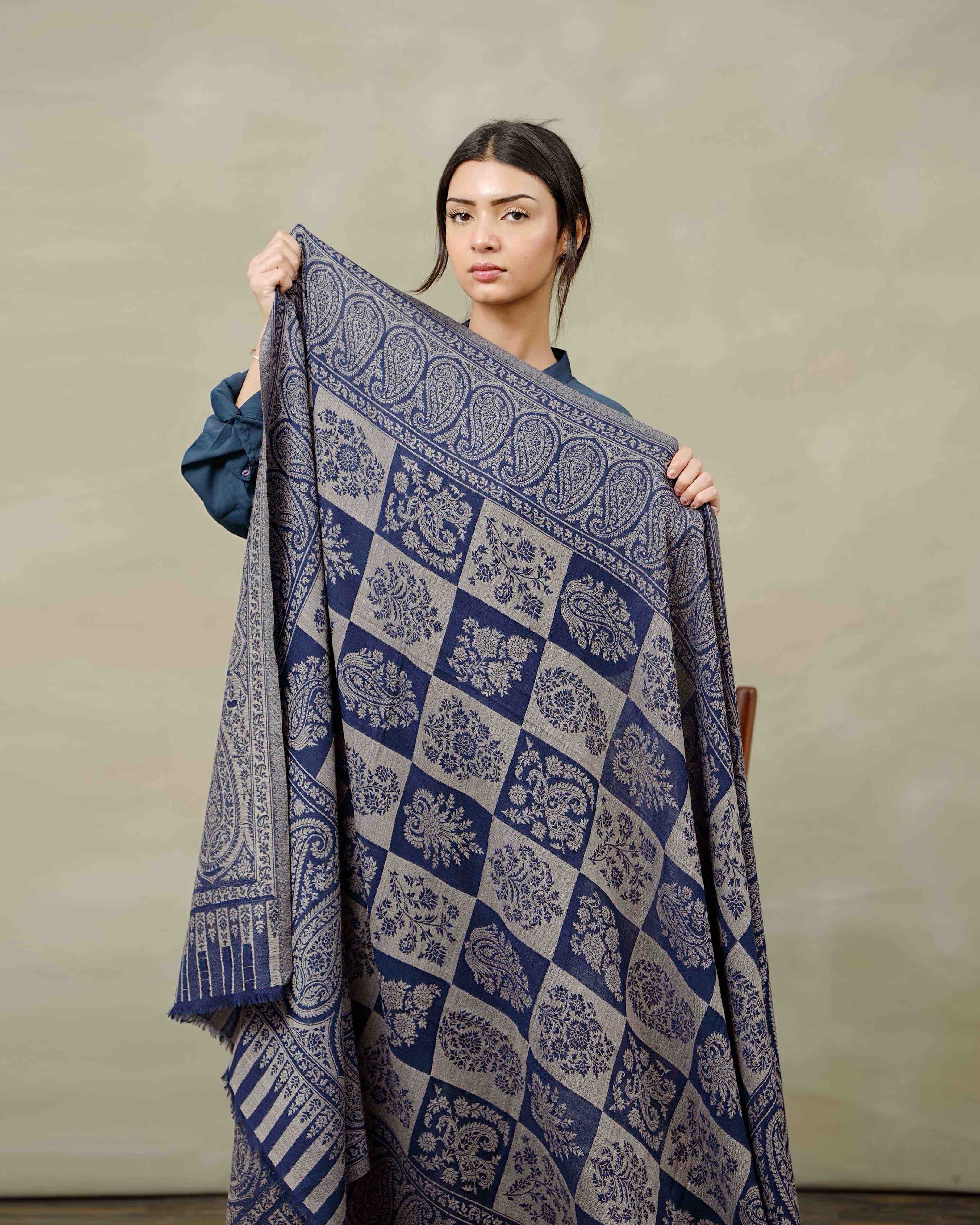 Front view of the Midnight Check Kani reversible shawl by Silsilah Studio